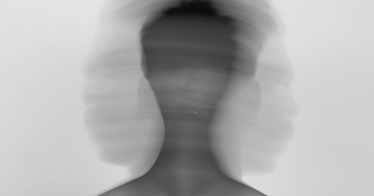 Person practicing deep breathing exercises for vagus nerve stimulation and stress relief